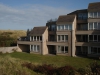 Buitenkant appartement vanuit duinen                   